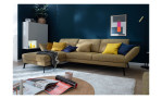Komfort - Ecksofa Spin, in der Farbausführung gelb, in einem Raum stehend, Schrägansicht